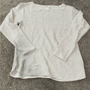 H&M sweater. Cream with black accents. Size small.